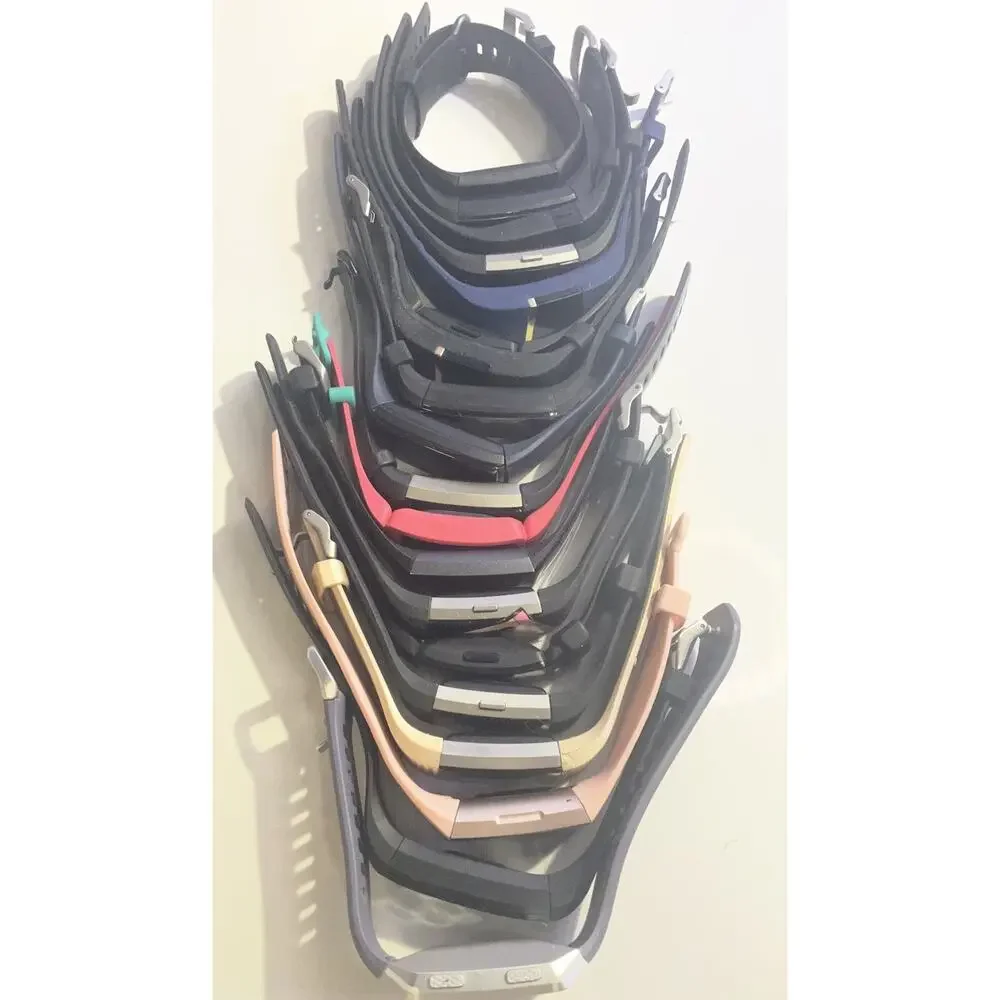 LOT OF 100 + Fitbit Watches Versa Charge Inspire Sense FOR PARTS and REPAIR
